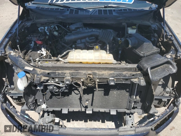 2021 Ford F-150 XL z VIN 1FTMF1E55MKD69649, wystawiony jako Copart lot #62709294 z przebiegiem Nie podano mil oraz Szkoda całkowita • Salvage title. Historia ofert i sprzedaży dostępna na DreamBid. Obrazek 11.