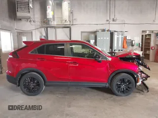 2022 Mitsubishi Eclipse Cross LE with VIN JA4ATVAA3NZ042272, listed as a IAAI auction lot 42027436 with 14,418 mi miles and . Bid and sale history available at DreamBid. Image 13.