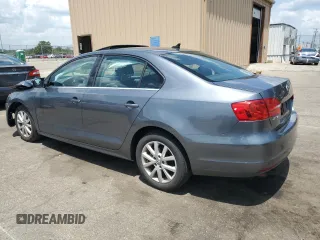 2013 Volkswagen Jetta SE with VIN 3VWDP7AJ8DM449097, listed as a Copart auction lot 62155135 with 130,266 mi miles and Salvage title. Bid and sale history available at DreamBid. Image 2.