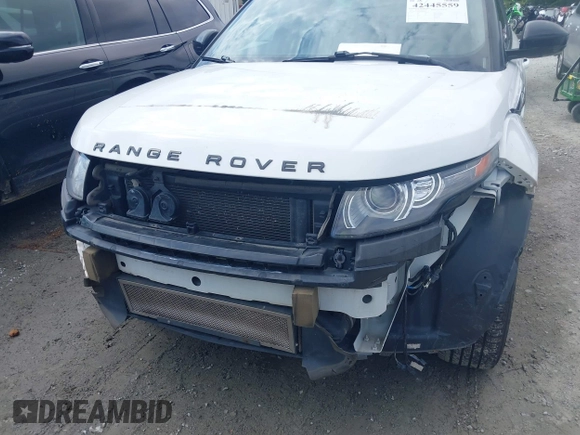 2014 Land Rover Range Rover Evoque Dynamic with VIN SALVT2BG0EH893971, listed as a IAAI auction lot 42445559 with 124,229 mi miles and . Bid and sale history available at DreamBid. Image 6.