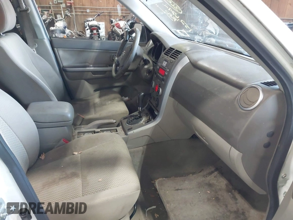 2009 Suzuki Grand Vitara z VIN JS3TD044294100168, wystawiony jako IAAI lot #42489252 z przebiegiem 152 679 mil mil oraz . Historia ofert i sprzedaży dostępna na DreamBid. Obrazek 5.