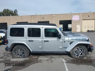 2023 Jeep Wrangler Rubicon with VIN 1C4JJXR69PW581474, listed as a IAAI auction lot 41697016 with 25,775 mi miles and . Bid and sale history available at DreamBid. Image 14.