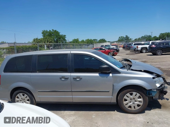 2016 Dodge Grand Caravan SE with VIN 2C4RDGBG9GR385847, listed as a IAAI auction lot 42042755 with 32,613 mi miles and . Bid and sale history available at DreamBid. Image 14.