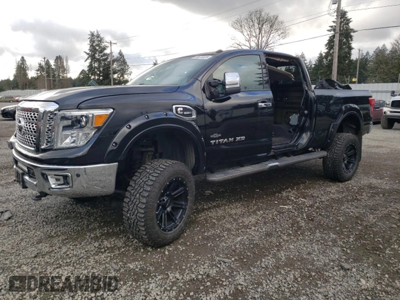 2016 Nissan Titan XD Platinum Reserve with VIN 1N6BA1F49GN500481, listed as a Copart auction lot 88679525 with 42,820 mi miles and Salvage Title. Bid and sale history available at carsss.com. Image 1.