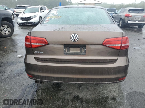 2015 Volkswagen Jetta S z VIN 3VW2K7AJ5FM293481, wystawiony jako Copart lot #58336035 z przebiegiem Nie podano mil oraz Szkoda całkowita • Salvage title. Historia ofert i sprzedaży dostępna na DreamBid. Obrazek 6.