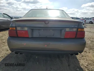1998 Cadillac Seville SLS z VIN 1G6KS54YXWU931108, wystawiony jako Copart lot #72369984 z przebiegiem 103 267 mil mil oraz Szkoda całkowita • Salvage title. Historia ofert i sprzedaży dostępna na DreamBid. Obrazek 6.