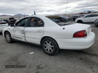 2001 Mercury Sable with VIN 1MEFM53U31A629921, listed as a Copart auction lot 77173754 with 122,769 mi miles and Salvage title. Bid and sale history available at DreamBid. Image 2.