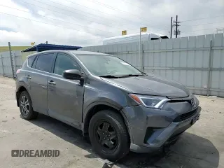 2018 Toyota RAV4 LE with VIN JTMBFREV1JJ746565, listed as a Copart auction lot 58141295 with 93,379 mi miles and Clean title. Bid and sale history available at DreamBid. Image 14.