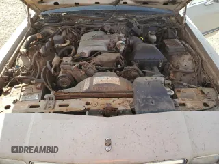 1991 Mercury Grand Marquis z VIN 2MECM75FXMX633893, wystawiony jako Copart lot #87439324 z przebiegiem 65 046 mil mil oraz Tytuł czysty. Historia ofert i sprzedaży dostępna na DreamBid. Obrazek 11.