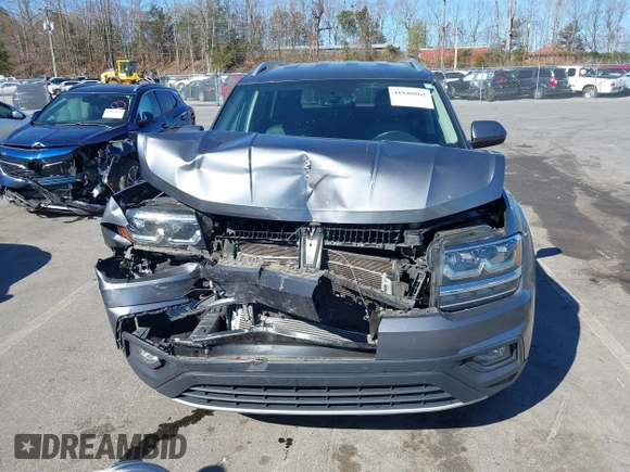 2018 Volkswagen Atlas SE with VIN 1V2CR2CA0JC571988, listed as a IAAI auction lot 41848862 with 96,426 mi miles and . Bid and sale history available at DreamBid. Image 12.