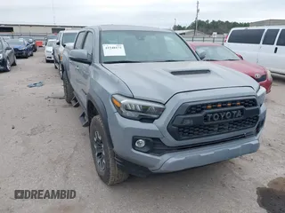 2021 Toyota Tacoma 4WD SR5 with VIN 3TMDZ5BN5MM116584, listed as a IAAI auction lot 41548175 with 23,031 mi miles. Bid and sale history available at carsss.com. Image 1.