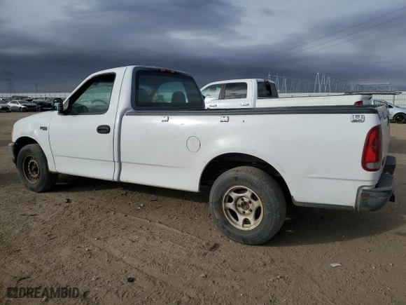 1997 Ford F-150 Standard with VIN 1FTDF1726VKC67880, listed as a Copart auction lot 86217364 with 242,124 mi miles and Salvage Title. Bid and sale history available at carsss.com. Image 2.