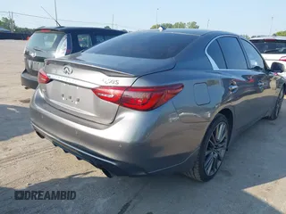2020 Infiniti Q50 Red Sport 400 with VIN JN1FV7AR8LM660823, listed as a IAAI auction lot 40322341 with 104,530 mi miles and . Bid and sale history available at carsss.com. Image 4.