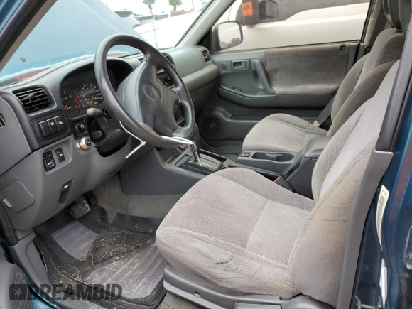 1999 Isuzu Rodeo S with VIN 4S2CK58W9X4322074, listed as a Copart auction lot 76999244 with 110,142 mi miles and Salvage Title. Bid and sale history available at carsss.com. Image 7.