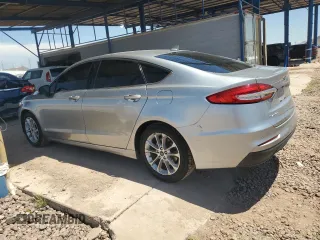 2020 Ford Fusion SE with VIN 3FA6P0HD3LR127008, listed as a Copart auction lot 54830665 with 122,179 mi miles and Salvage title. Bid and sale history available at DreamBid. Image 2.