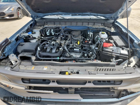2024 Ford Bronco Big Bend with VIN 1FMDE7BH7RLA03788, listed as a Copart auction lot 65085065 with 10,597 mi miles and Salvage title. Bid and sale history available at DreamBid. Image 12.