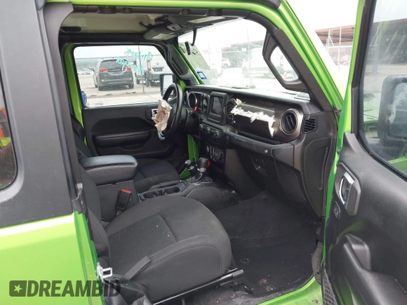 2020 Jeep Wrangler Sport S with VIN 1C4GJXAG1LW103235, listed as a IAAI auction lot 42126250 with 64,986 mi miles and . Bid and sale history available at DreamBid. Image 5.