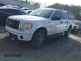 2014 Ford F-150 XL with VIN 1FTFW1EF2EFB93610, listed as a IAAI auction lot 41515501 with 211,415 mi miles and . Bid and sale history available at DreamBid. Image 2.