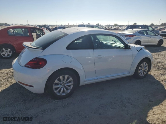 2019 Volkswagen Beetle S with VIN 3VWFD7AT3KM710393, listed as a Copart auction lot 72270664 with 63,627 mi miles and Salvage Title. Bid and sale history available at carsss.com. Image 3.