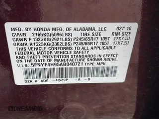 2010 Honda Pilot Touring with VIN 5FNYF4H95AB040721, listed as a IAAI auction lot 41928412 with 213,219 mi miles and . Bid and sale history available at carsss.com. Image 9.