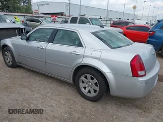 2006 Chrysler 300 Touring with VIN 2C3KA53GX6H113815, listed as a IAAI auction lot 42149912 with 144,813 mi miles. Bid and sale history available at carsss.com. Image 3.