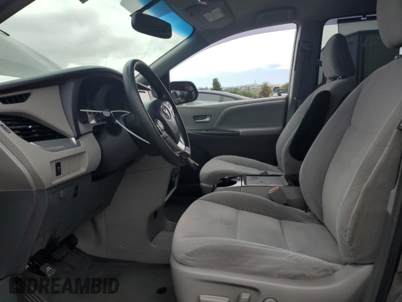 2015 Toyota Sienna LE AAS with VIN 5TDKK3DC1FS577795, listed as a Copart auction lot 66215355 with 197,902 mi miles and Salvage title. Bid and sale history available at DreamBid. Image 7.