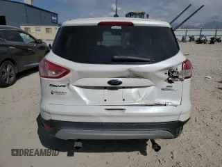 2015 Ford Escape SE with VIN 1FMCU0GX9FUC26779, listed as a Copart auction lot 52772325 with 135,121 mi miles and Salvage Title. Bid and sale history available at DreamBid. Image 6.