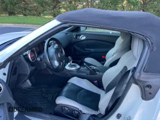 2012 Nissan 370Z Touring with VIN JN1AZ4FH4CM370351, listed as a Copart auction lot 77653994 with 98,326 mi miles and Salvage Title. Bid and sale history available at carsss.com. Image 9.