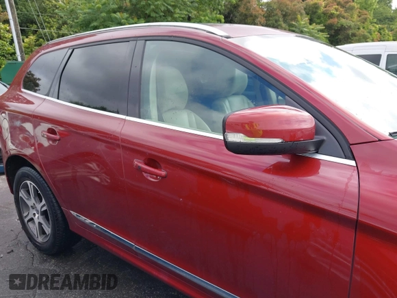 2015 Volvo XC60 T6 with VIN YV4902RKXF2669393, listed as a IAAI auction lot 42380410 with 124,258 mi miles and . Bid and sale history available at DreamBid. Image 13.