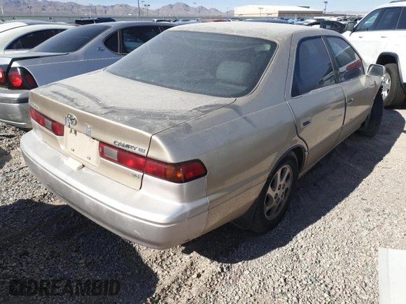 1999 Toyota Camry LE z VIN JT2BF28K5X0200853, wystawiony jako Copart lot #50666075 z przebiegiem Nie podano mil oraz Nie do naprawy • Non repairable. Historia ofert i sprzedaży dostępna na DreamBid. Obrazek 3.
