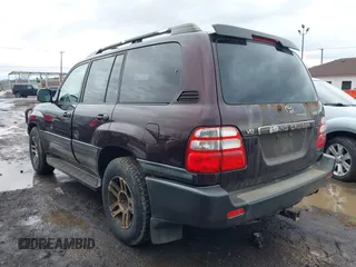 2004 Toyota Land Cruiser with VIN JTEHT05J242066695, listed as a IAAI auction lot 41725358 with 226,895 mi miles. Bid and sale history available at carsss.com. Image 3.