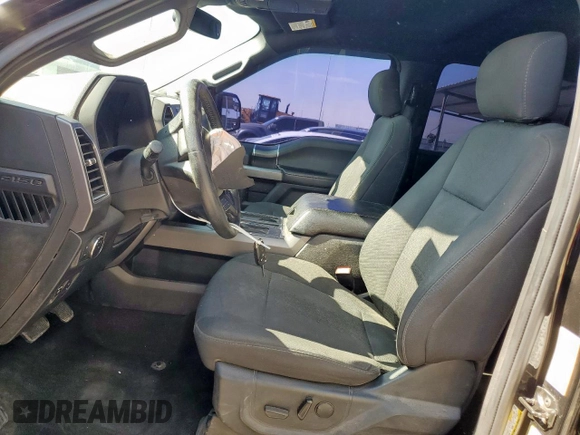 2019 Ford F-150 XL with VIN 1FTEW1EP2KFC25018, listed as a Copart auction lot 63105465 with 60,331 mi miles and Salvage title. Bid and sale history available at DreamBid. Image 7.