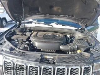 2017 Jeep Grand Cherokee Laredo with VIN 1C4RJFAG7HC876531, listed as a IAAI auction lot 41354471 with 129,056 mi miles. Bid and sale history available at carsss.com. Image 10.