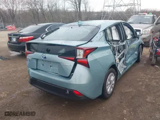 2022 Toyota Prius L Eco with VIN JTDKAMFU4N3164963, listed as a IAAI auction lot 41859931 with 5,118 mi miles. Bid and sale history available at carsss.com. Image 6.