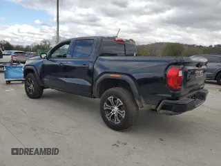 2024 GMC Canyon 4WD AT4 with VIN 1GTP6DEK9R1170928, listed as a Copart auction lot 77978644 with 0 mi miles and Salvage Title. Bid and sale history available at carsss.com. Image 2.