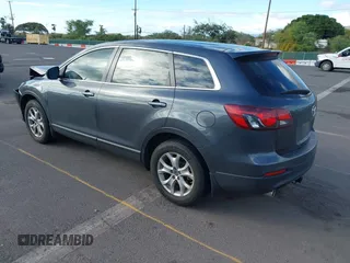 2014 Mazda CX-9 Sport with VIN JM3TB3BAXE0442006, listed as a IAAI auction lot 41430742 with 82,682 mi miles and . Bid and sale history available at DreamBid. Image 3.