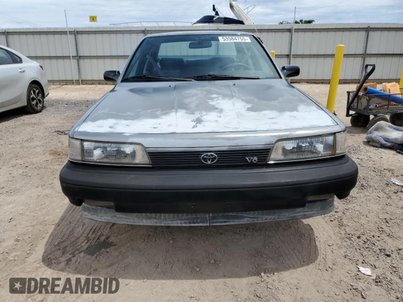 1990 Toyota Camry z VIN JT2VV21E2L0114723, wystawiony jako Copart lot #53584755 z przebiegiem 58 986 mil mil oraz Czysty tytuł • Clean title. Historia ofert i sprzedaży dostępna na DreamBid. Obrazek 5.