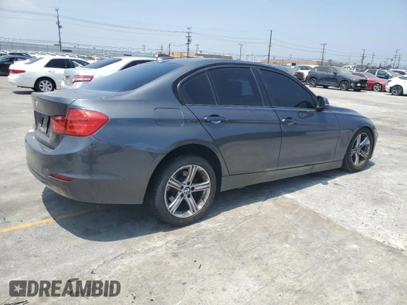 2015 BMW 3 Series 328i with VIN WBA3A5G5XFNS86943, listed as a Copart auction lot 57620325 with 154,165 mi miles and Salvage title. Bid and sale history available at DreamBid. Image 3.