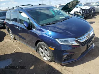 2020 Honda Odyssey EX-L with VIN 5FNRL6H7XLB044239, listed as a Copart auction lot 51140925 with 106,702 mi miles and Salvage Title. Bid and sale history available at carsss.com. Image 4.