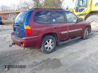 2004 GMC Envoy SLE with VIN 1GKDS13S342287315, listed as a IAAI auction lot 41486715 with 186,129 mi miles. Bid and sale history available at carsss.com. Image 4.