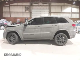 2019 Jeep Grand Cherokee Laredo E with VIN 1C4RJFAG9KC667394, listed as a IAAI auction lot 41316264 with 55,156 mi miles. Bid and sale history available at carsss.com. Image 14.