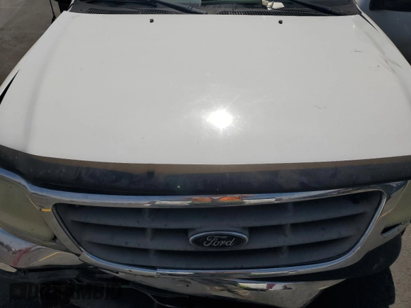 2003 Ford F-150 XL with VIN 2FTRX17L23CA17128, listed as a Copart auction lot 60144965 with 121,055 mi miles and Salvage title. Bid and sale history available at DreamBid. Image 11.