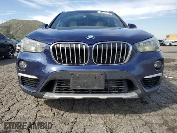 2018 BMW X1 sDrive28i with VIN WBXHU7C30J5H42351, listed as a Copart auction lot 49173875 with 139,084 mi miles and Clean Title. Bid and sale history available at carsss.com. Image 5.