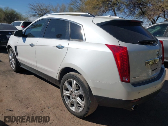 2013 Cadillac SRX Performance Collection with VIN 3GYFNDE37DS599557, listed as a IAAI auction lot 41633569 with 100,611 mi miles and . Bid and sale history available at DreamBid. Image 3.