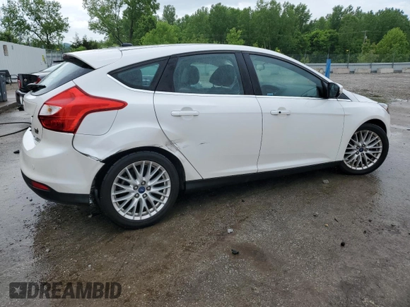 2014 Ford Focus Titanium with VIN 1FADP3N28EL418651, listed as a Copart auction lot 56723475 with 94,773 mi miles and Salvage title. Bid and sale history available at DreamBid. Image 3.