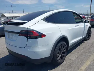 2016 Tesla Model X 70D z VIN 5YJXCAE29GF002170, wystawiony jako IAAI lot #42334842 z przebiegiem 119 104 mil mil oraz . Historia ofert i sprzedaży dostępna na DreamBid. Obrazek 4.