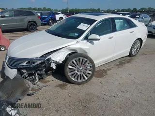 2016 Lincoln MKZ z VIN 3LN6L2G98GR618707, wystawiony jako IAAI lot #42569269 z przebiegiem 159 545 mil mil oraz . Historia ofert i sprzedaży dostępna na DreamBid. Obrazek 18.