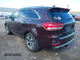 2016 Kia Sorento SX with VIN 5XYPKDA58GG002304, listed as a IAAI auction lot 41990332 with 132,025 mi miles. Bid and sale history available at carsss.com. Image 3.