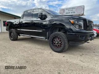 2018 Nissan Titan XD SV with VIN 1N6BA1F41JN515743, listed as a Copart auction lot 41860755 with 122,932 mi miles and Clean Title. Bid and sale history available at carsss.com. Image 1.