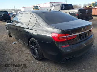 2019 BMW 7 Series 750i xDrive with VIN WBA7F2C52KB240302, listed as a IAAI auction lot 40984933 with 93,737 mi miles and . Bid and sale history available at DreamBid. Image 3.